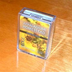 Photo of the game in its clear plastic box - Appalachian Homestead Starter Deck for EDGE of EXTINCTION: The Educational Trading Card Game